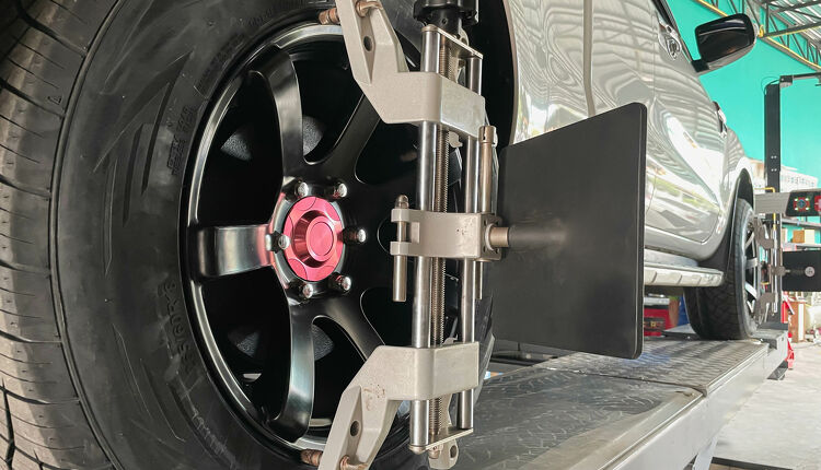 Car getting a wheel alignment  Capital Tyres Hamilton - Drive through service