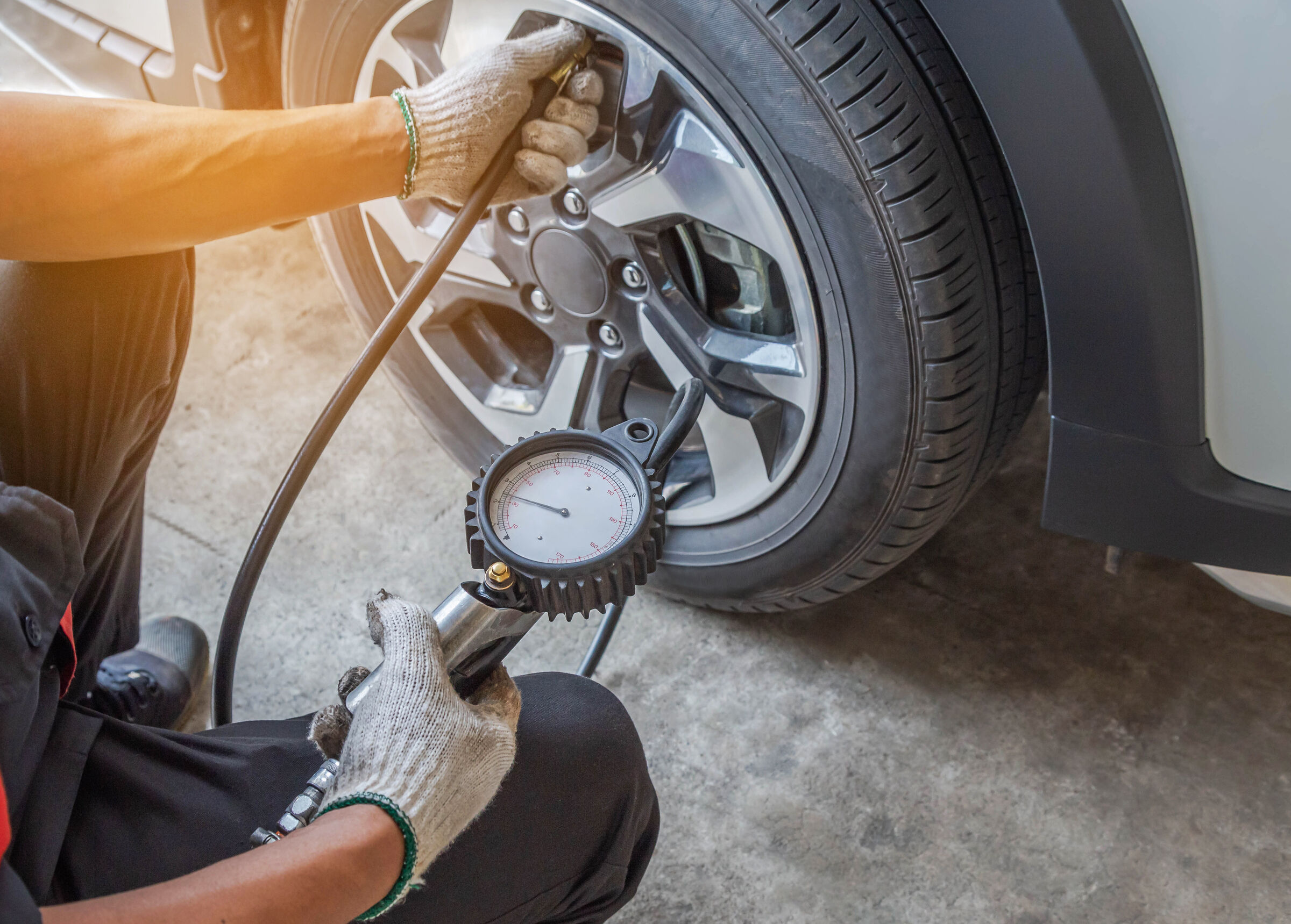 Man Inflating a Tyre With Nitrofill