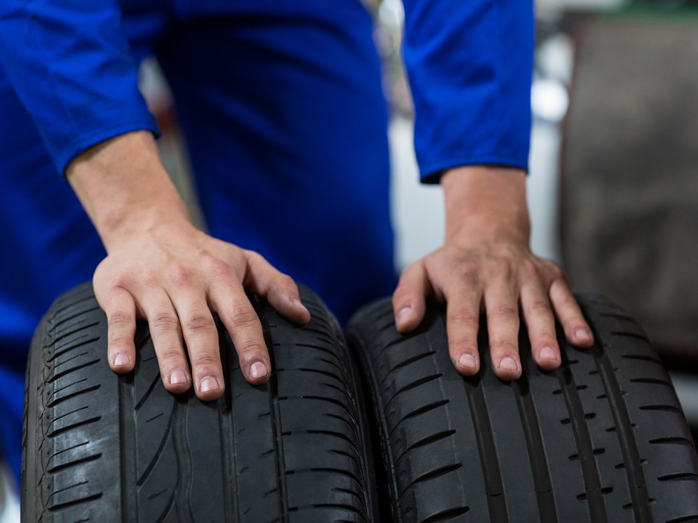 Man holding Commercial Tyres